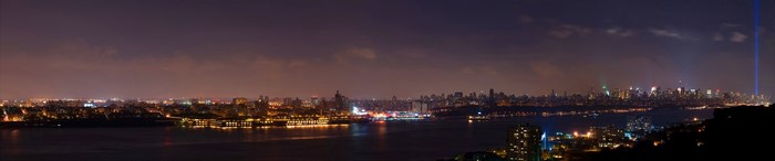 New York City skyline at night with tribute in light