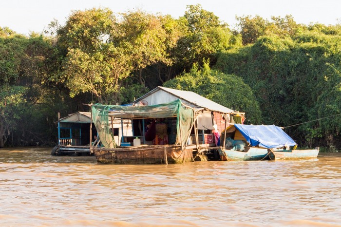 Floating house on a river in Cambodia
