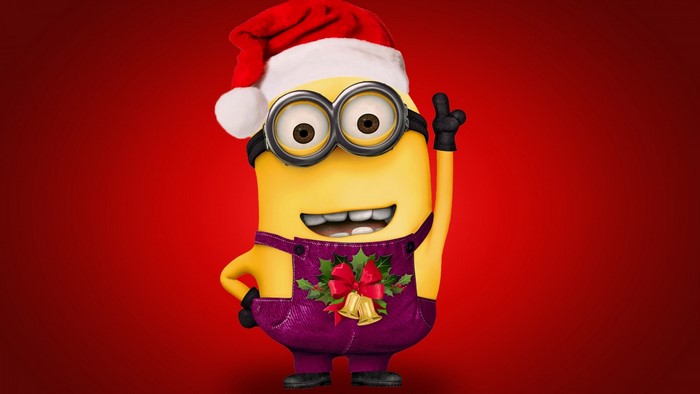 Minion wearing a Santa hat and Christmas overalls
