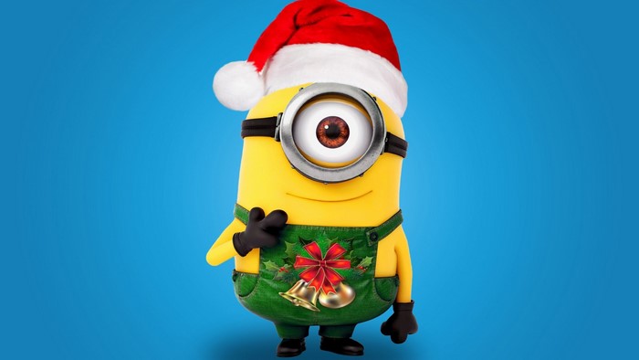 Minion wearing a Santa hat and Christmas overalls