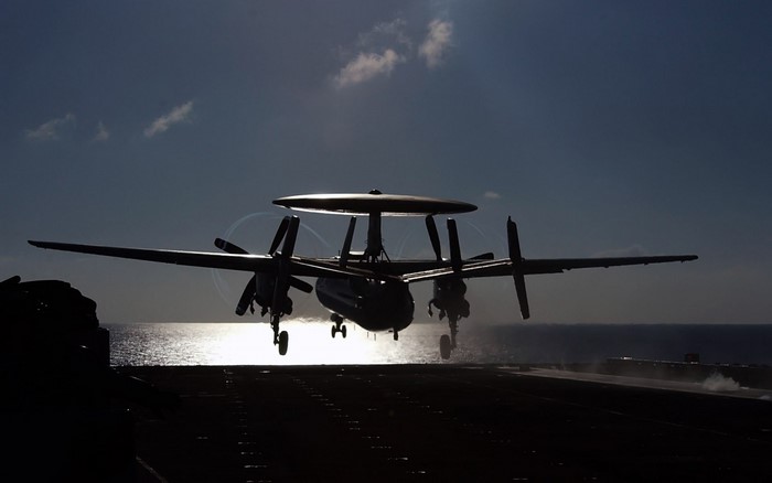 Northrop Grumman E-2 Hawkeye landing on an aircraft carrier