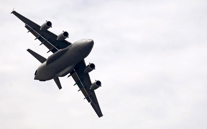 USAF C-17 Globemaster III military transport aircraft flying
