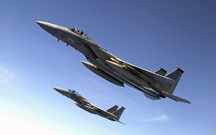 Two McDonnell Douglas F-15 Eagle fighter jets in flight