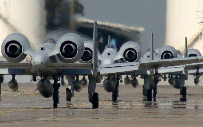 Multiple Fairchild Republic A-10 Thunderbolt II aircraft on tarmac