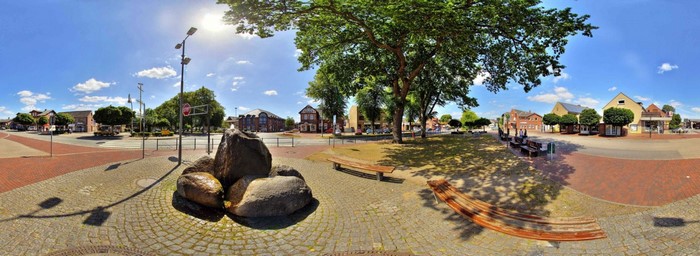 Town square with fountain and trees