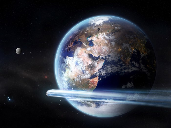 Earth with moon and ring in space
