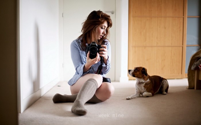 Woman with camera and Jack Russell Terrier