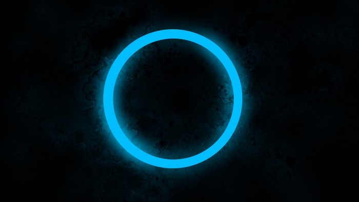 Blue neon circle on dark textured background
