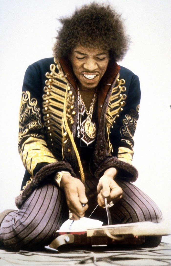 Jimi Hendrix playing guitar
