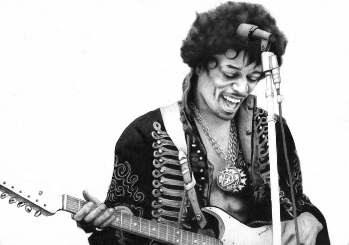 Jimi Hendrix playing guitar on stage