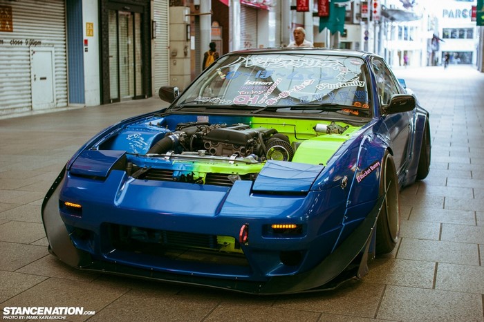Blue Nissan Silvia S13 Rocket Bunny with open hood