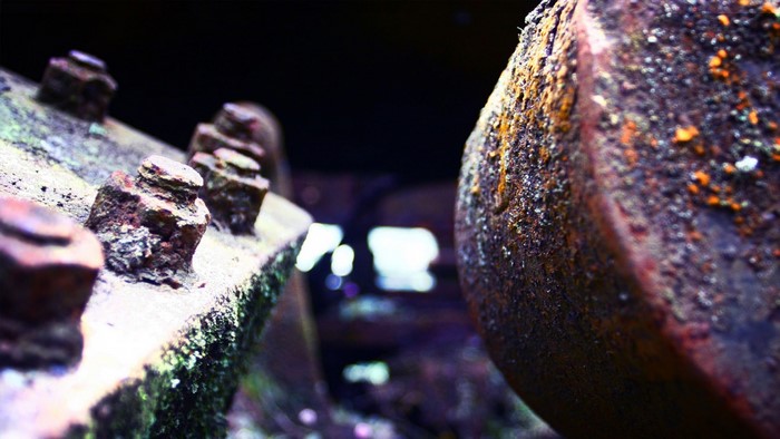 Close-up of rusty bolts on metal