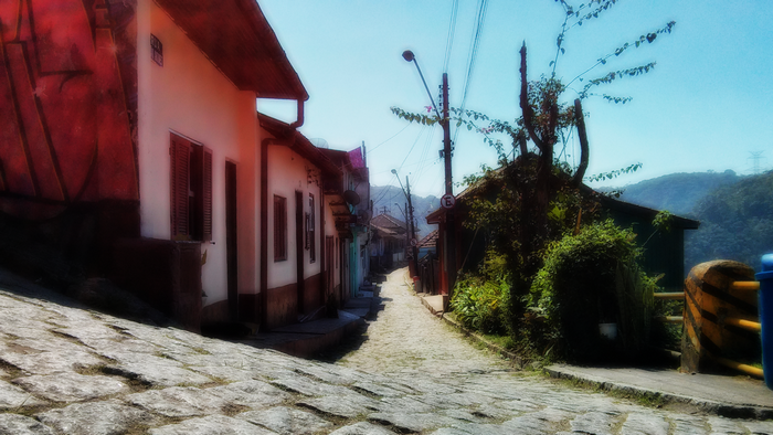Cobblestone street in a Brazilian village with old houses