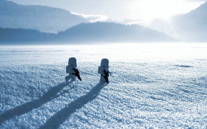 Two Stormtroopers from Star Wars walking on snow