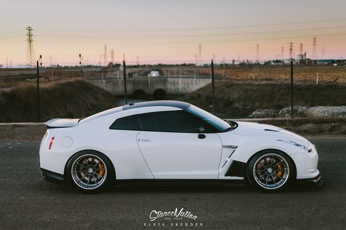 White Nissan GT-R R35 with custom wheels