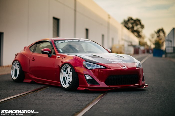 Red Scion FR-S with custom wheels and body kit