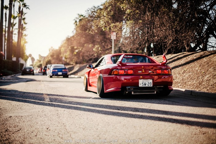 Red Toyota MR2 on a sunny street
