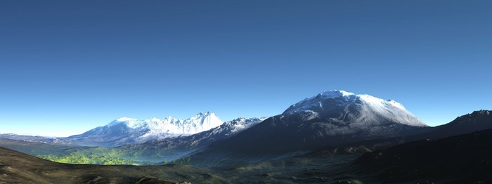 Snow-capped mountains under a clear blue sky