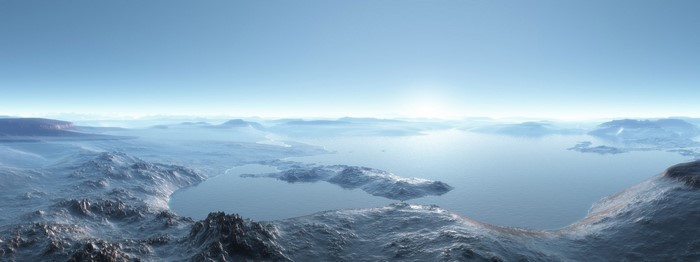 Panoramic view of a vast, icy landscape with mountains and a calm sea.