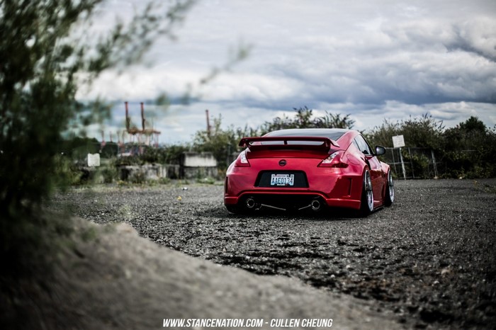 Red Nissan 370Z sports car parked outdoors
