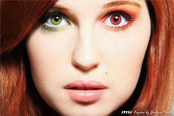 Woman with Heterochromatic Eyes and Red Hair
