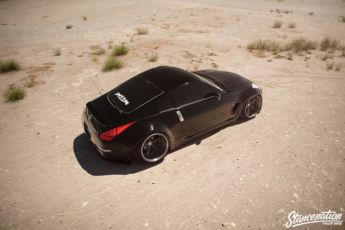 Black Nissan 350Z on dirt lot