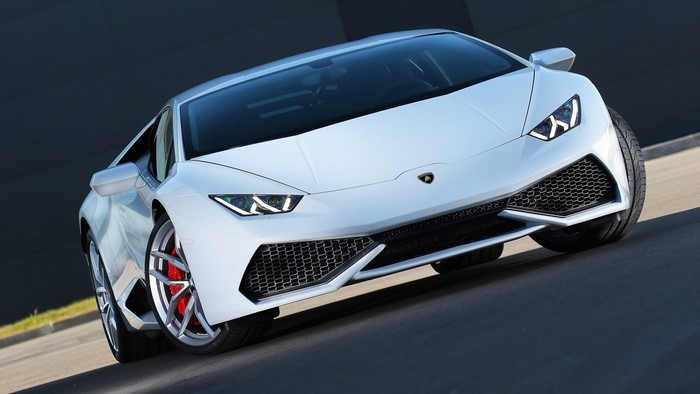 White Lamborghini Huracan parked on a road