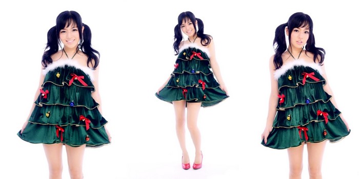 Woman in a Christmas tree costume