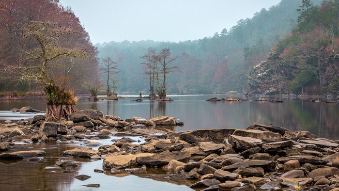 Beavers Bend State Park lake with trees and rocks