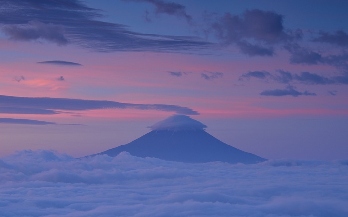Mount Fuji above clouds at sunrise