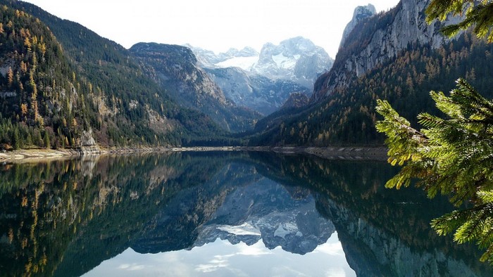 Mountain lake reflection in the Alps