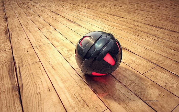 Futuristic black and red ball on a wooden floor
