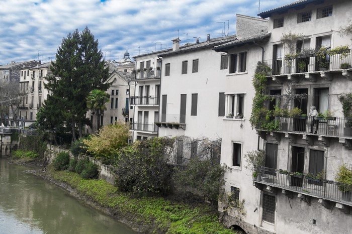 Buildings along a canal in Vicenza, Italy