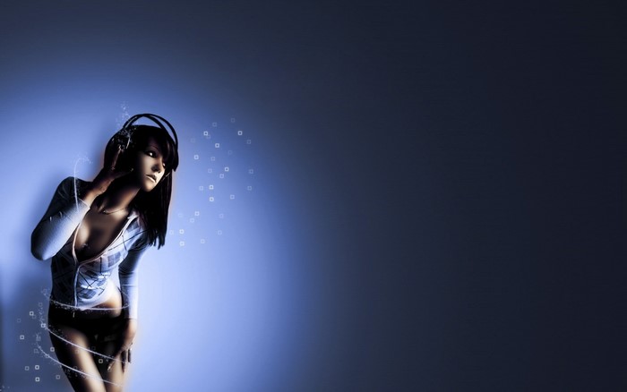 Woman wearing headphones listening to music
