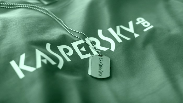 Kaspersky logo on a green t-shirt with a dog tag