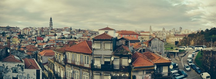 Porto cityscape with historic buildings and a distant tower