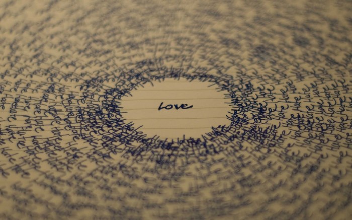 Circular text pattern with the word Love in the center