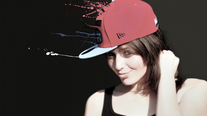 Woman wearing a red New Era cap