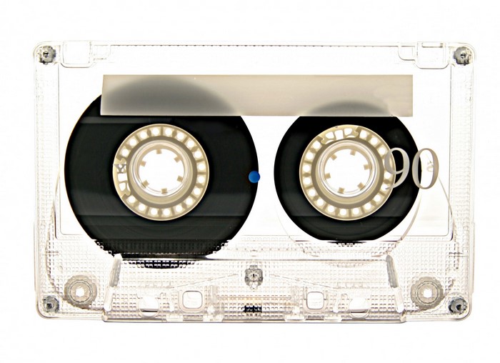 Transparent cassette tape with label '90'
