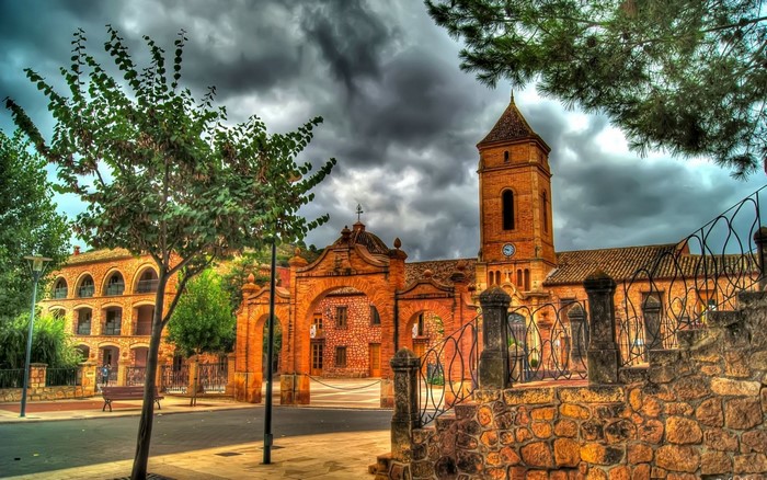 Church and town square with dramatic clouds