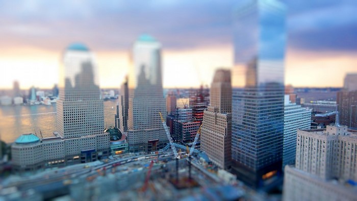 Tilt-shift cityscape of New York City skyscrapers at sunset