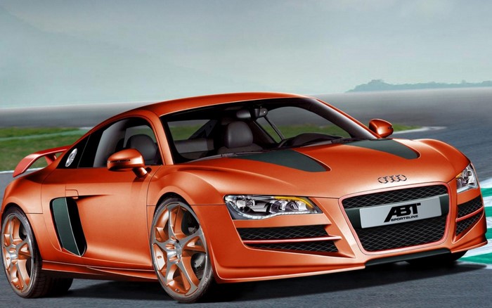 Orange Audi R8 ABT Sportsline on a Racetrack