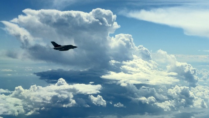 Panavia Tornado jet flying through clouds