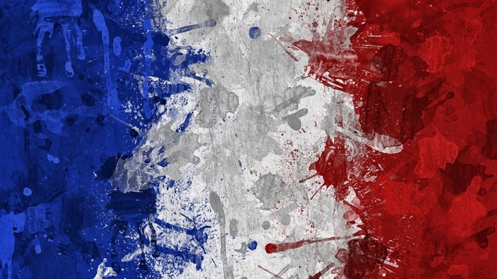 French flag with paint splatters