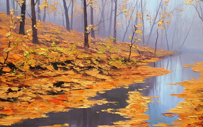 Autumn forest with a stream and fallen leaves