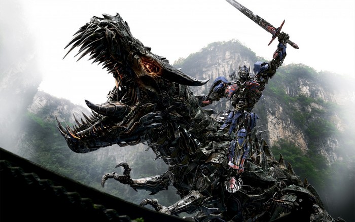 Optimus Prime riding Grimlock in Transformers Age of Extinction