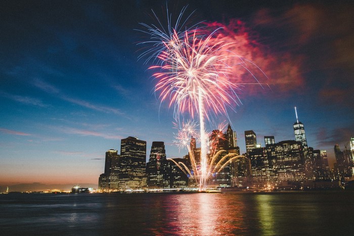 Fireworks over New York City skyline at night