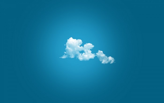 A single cloud against a blue sky