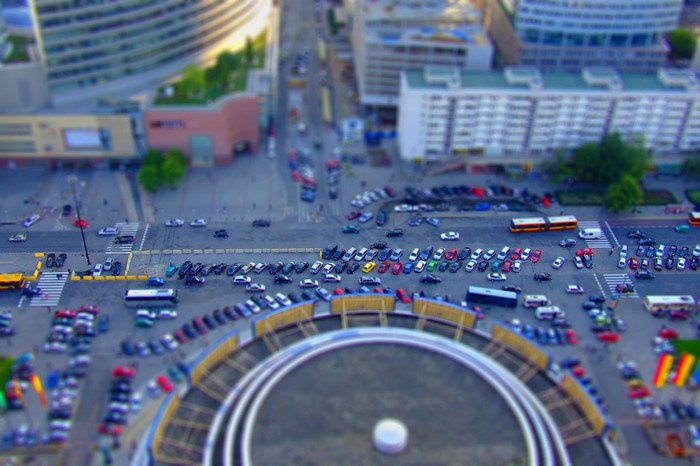 Tilt-shift view of city traffic and buildings in Warsaw