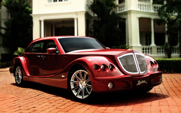 Red Bufori Sedan parked on brick driveway